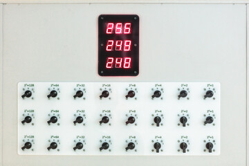 System Parameter Display an electronic display with adjustment knobs and numerical indicators