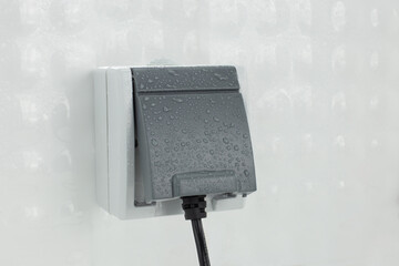 Waterproof Outdoor Electrical Socket with Water Droplets
