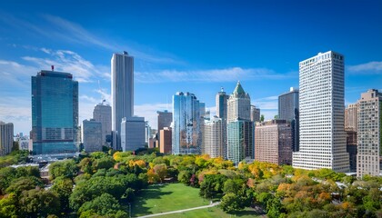 Obraz premium Chicago Skyline and Park: Aerial View of Skyscrapers and Autumn Foliage