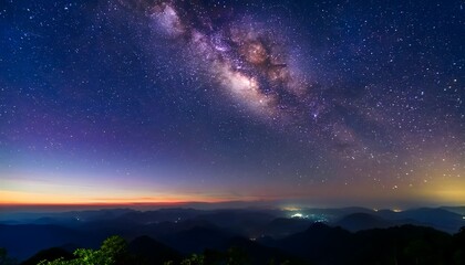 Obraz premium Milky Way Galaxy over Mountain Range at Twilight