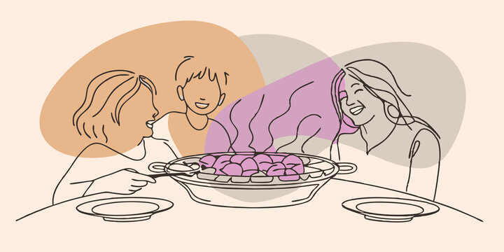 A smiling family gathers around the table delighting in the shared experience of this traditional dish.