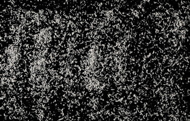 Grated coconut isolated on black, top view