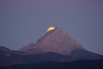 Moonrise. Aftermath of a full moon rising behind the mountain