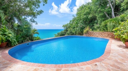 Fototapeta premium Tropical oasis: serene pool overlooking vibrant blue ocean surrounded by lush greenery