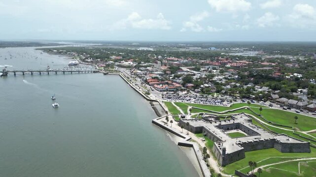 The Spanish fort, Castillo de San Marcos, a historic National Monument along the Mantanzas River wotj the city of  St. Augustine, Florida in the background. 