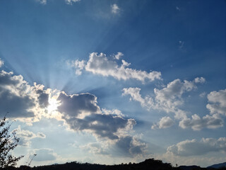 
Blue sky and white puffy clouds
