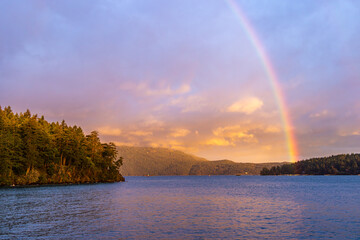 Scenic Rainbow Over Vancouver Island Coastal Landscape