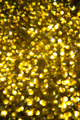 Golden bokeh. Bokeh gold background. Golden bokeh background. Abstract background with copy space. Holiday backgrounds.