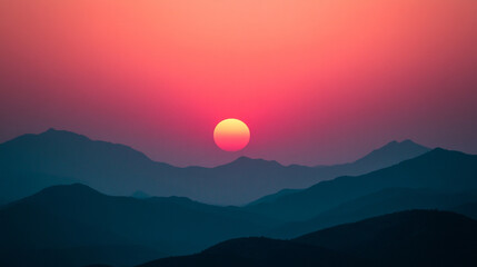 Obraz premium Vibrant sunset over mountain silhouettes creates a serene atmosphere
