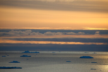 Beautiful Greenland icebergs in the Arctic in autumn