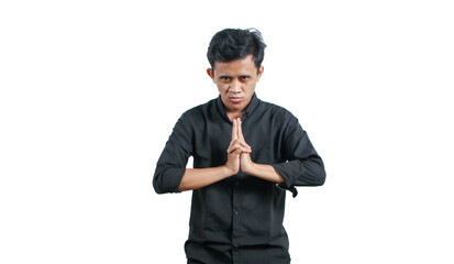 Asian man posing for ninja moves isolated on white background © Restu