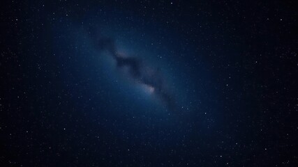 Fototapeta premium A breathtaking view of the starry sky with a distant galaxy visible as a shining light against a backdrop of deep space and inky blackness, universe, boundless, shine