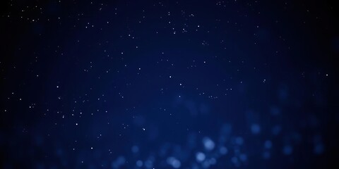 Obraz premium Dark blue night sky with glittering stars and a sparkling glitter bokeh in the foreground, night sky, galaxy