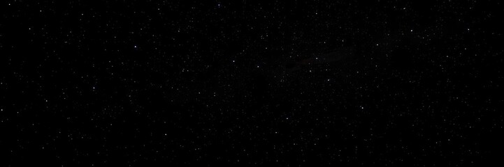 Fototapeta premium Inky blackness punctuated by diamonds of starlight in a breathtaking display of the celestial showcase at dusk, astronomy, night sky