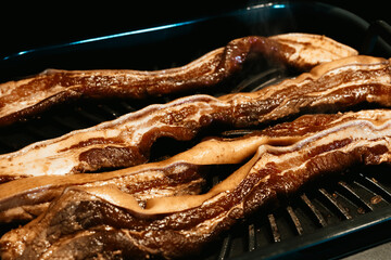Grilling a pork belly liempo in a Ninja Foodie indoor grill. This is a famous Filipino delicacy.