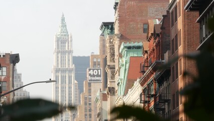 Fototapeta premium New York City Manhattan Soho fashion district, Broadway street. USA urban old classic american architecture. Shopping in NYC, United States. Business and residential real estate. Woolworth building.