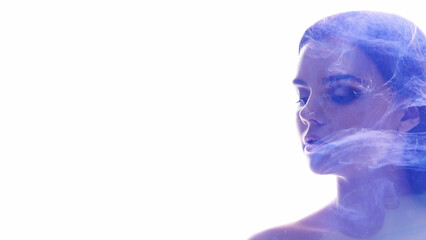 Fantasy lady. Energy power. Purple glitter smoke flowing in woman silhouette double exposure...