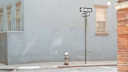 New York City oneway crossroad, Minetta street intersection one way arrow road sign. Manhattan...