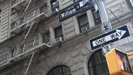 New York City crossroad, William street intersection road sign. NYC Manhattan downtown financial...