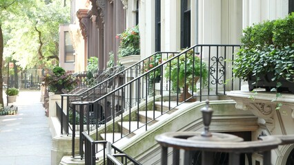 New York City townhouse building, Brooklyn Heights residential district, USA. Brownstone urban architecture, attached house. United States real estate, american property, apartments and homes in NYC.