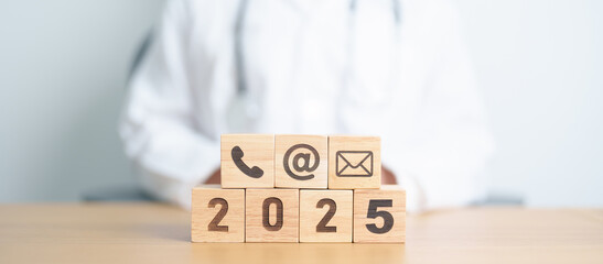 Contact Us concepts. Happy New Year 2025 with Wood block of Email, call Phone and Website Address...