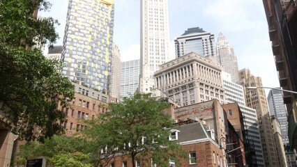 Fototapeta premium New York City Lower Manhattan, Downtown Financial District architecture, United States. High-rise skyscrapers, residential and office buildings, USA. American old Pearl street, real estate or realty.