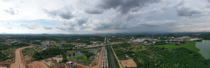 Obraz premium New construction site with crane and mechanical equipments on blue sky background, Infrastructure of high-speed train construction site of Chinese made FuxingHao, base from CR400AF for transportation.