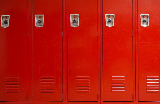 close up on red lockers in the school