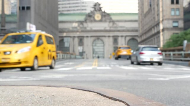 New York City Grand Central Terminal railway station building architecture, 42 street. Manhattan Midtown. Yellow taxi cab, car transport, Pershing Square bridge, NYC, USA. American urban road traffic.