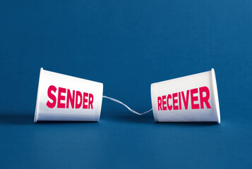 Sender and receiver communicating through a string telephone on blue background