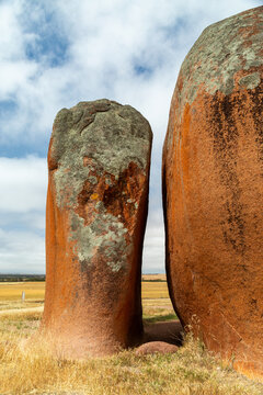 Inselberg rock formations known as Murphy's Haystacks in a wheat field.
