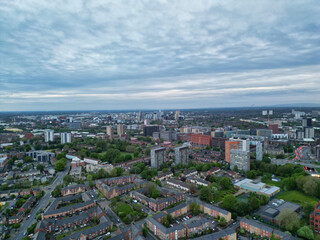 Fototapeta premium Aerial View of Buildings at Greater Manchester Central City, Northwest of England, United Kingdom. Aerial View Footage Was Captured with Drone's Camera on May 4th, 2024 During Sunset Time.