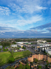 Fototapeta premium Aerial View of Buildings at Greater Manchester Central City, Northwest of England, United Kingdom. Aerial View Footage Was Captured with Drone's Camera on May 4th, 2024 During Sunset Time.