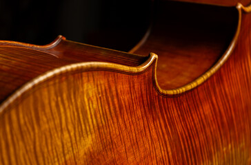 cello close up, classical music background, classic string instrument, violin texture wooden...