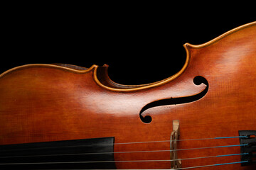 cello front close up, classical music background, classic string instrument, violin texture wooden...