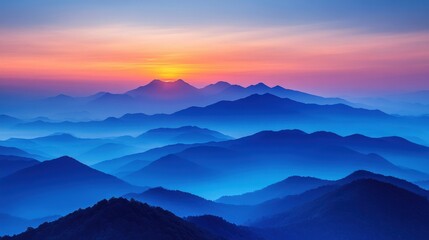 Obraz premium A serene mountain landscape at dawn, showcasing layers of blue hills under a colorful sky.