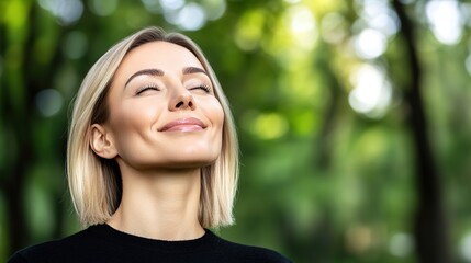 Fototapeta premium Woman Enjoying Nature with Peaceful Expression in Lush Green Forest Setting, Emphasizing Tranquility and Connection to the Outdoors