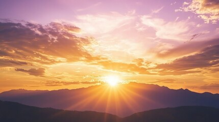 Obraz premium Majestic Sunset Skyscape with Silhouetted Mountains - Tranquil and Breathtaking Scene of Vibrant Colors and Golden Reflections