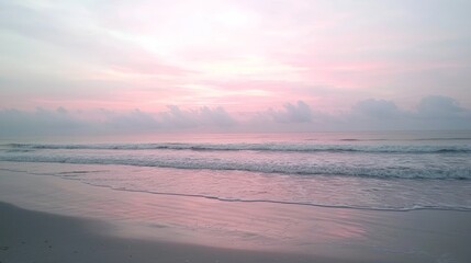 Fototapeta premium Serene Dawn Skyscape with Soft Pastel Colors and Gentle Waves | Tranquil Coastal Landscape for Relaxation and Renewal