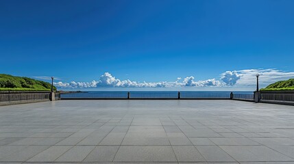 Obraz premium Scenic Ocean View from a Wide Open Terrace Under Clear Blue Sky