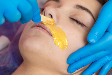 Epilation Concepts. Hot Wax Hair Removal Depilation for Female Skin as Sugar Bodycare from...