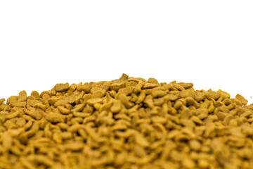 Obraz premium fish-shaped cat food on a white background, perfect for catalog displays, commercial advertisements, or pet product promotions.