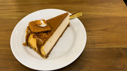 Rich caramel cheesecake with a smooth caramel biscuit and crumble