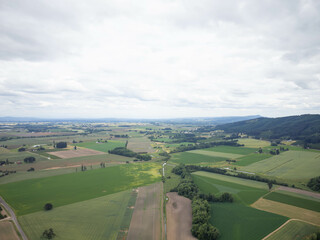 A large, open field with a river running through it