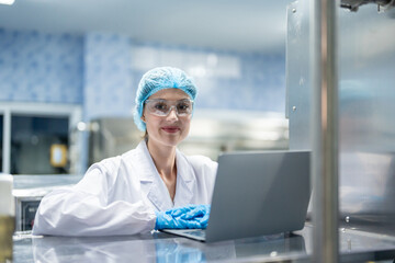 Portrait of Caucasian scientist working in laboratory at warehouse. 