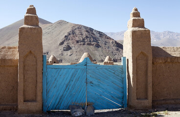 Entrance at the Old Graveyard in Murghab in the Pamir Mountains of Gorno-Badakhshan region in...