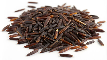 Wild rice is nutritious grain known for its rich, dark color and unique flavor. This pile of wild rice showcases its elongated shape and deep hues, making it visually appealing addition to various
