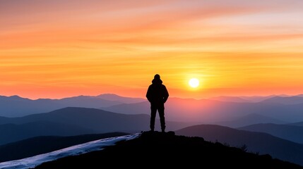 Fototapeta premium Travel adventure accommodation concept. A silhouette of a person stands atop a mountain, gazing at a vibrant sunrise over rolling hills.