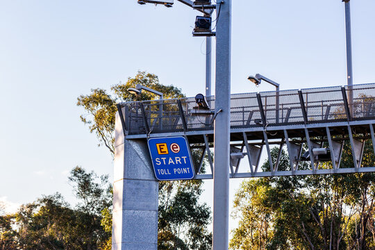 Start toll point sign with e-tag signage at entrance of road
