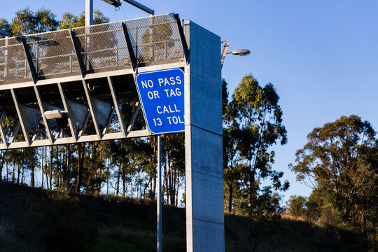 no pas or tag sign at toll point beside highway road